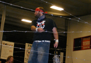 Illustration for article titled Wrestler Could Have Gotten Away With Robbing A Bank If It Wasn't For His Meddling Fans